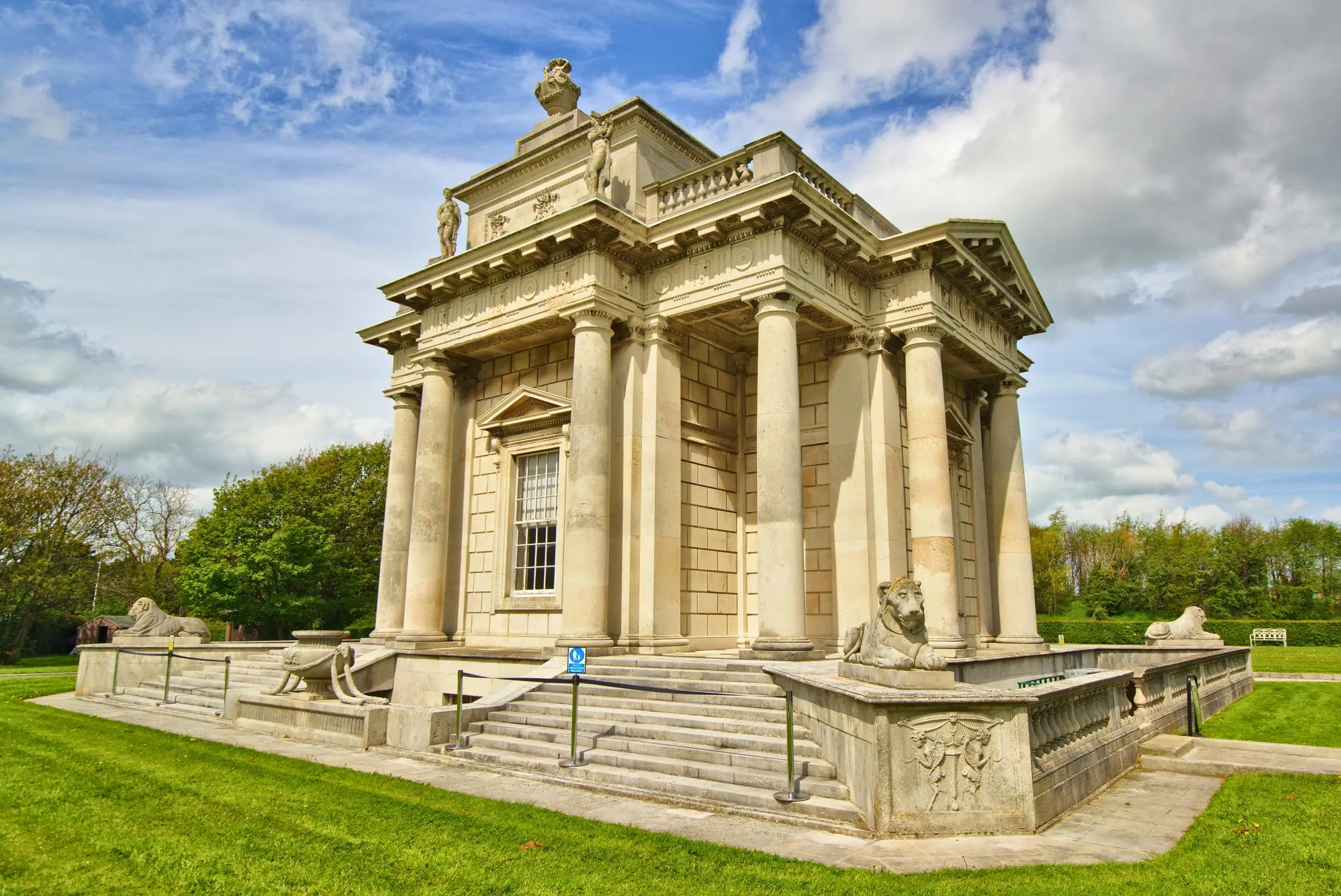 The neoclassical exterior of Casino Marino in Dublin surrounded by green lawns